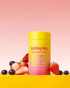 Cuttea Cutting Mix tub with fresh strawberries and blueberries